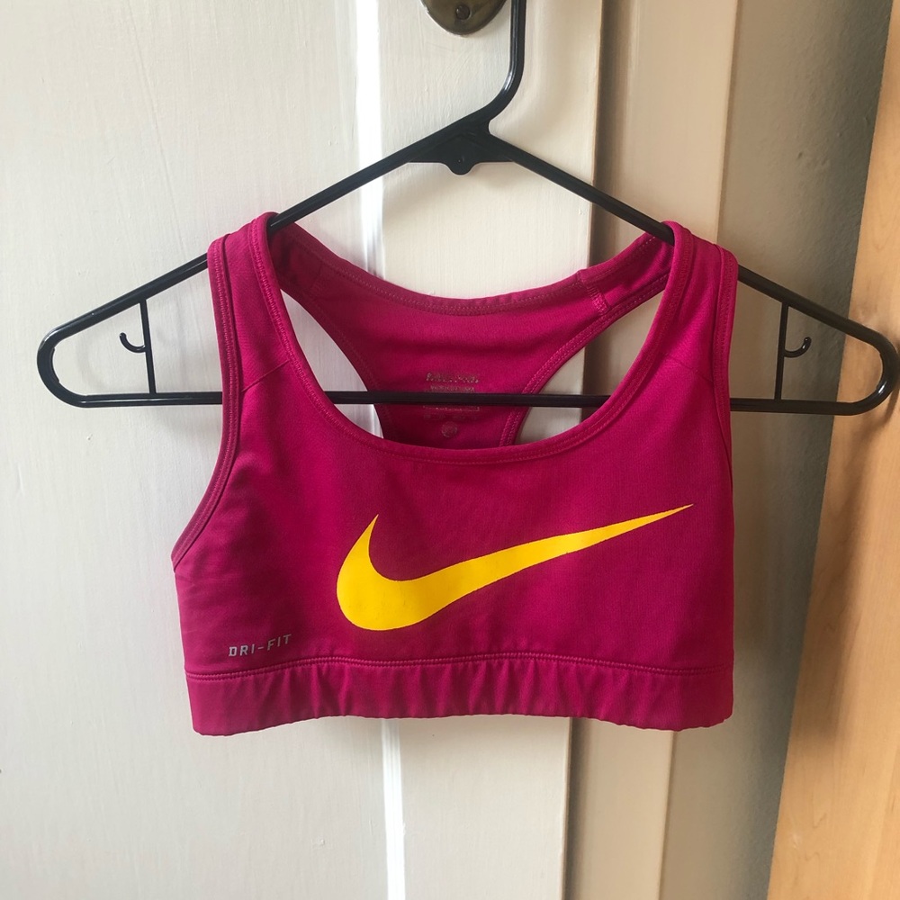 Pink Nike swoosh dri fit sports bra